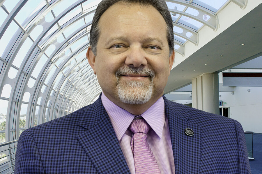 portrait of Rip Rippetoe in front of San Diego Convention Center windows