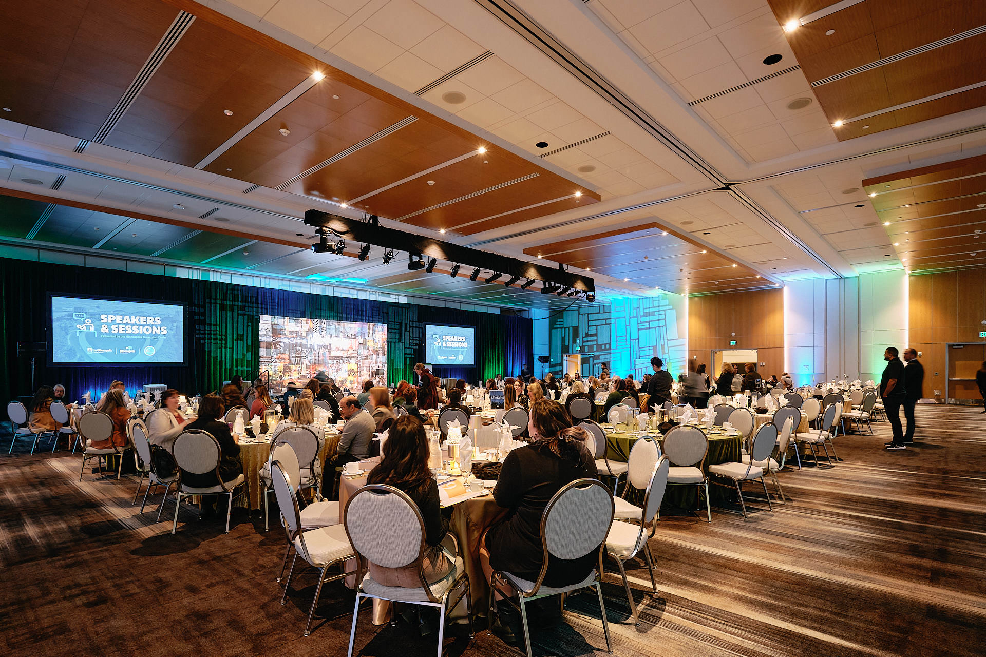 MCC meeting room with attendees sitting at tables